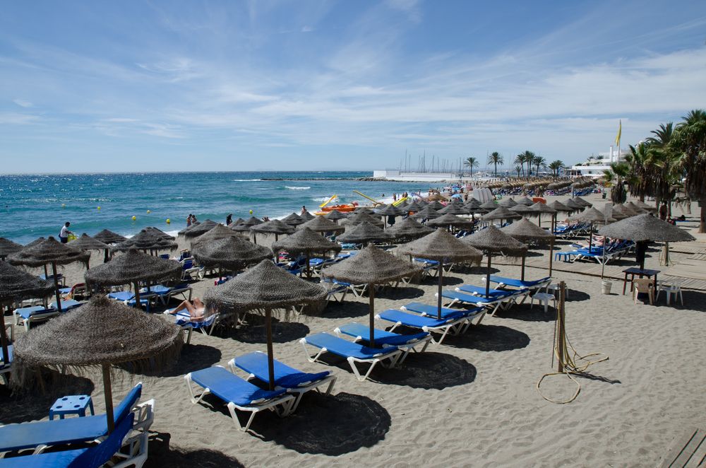 Beach chairs and umbrellas at La Venus Beach