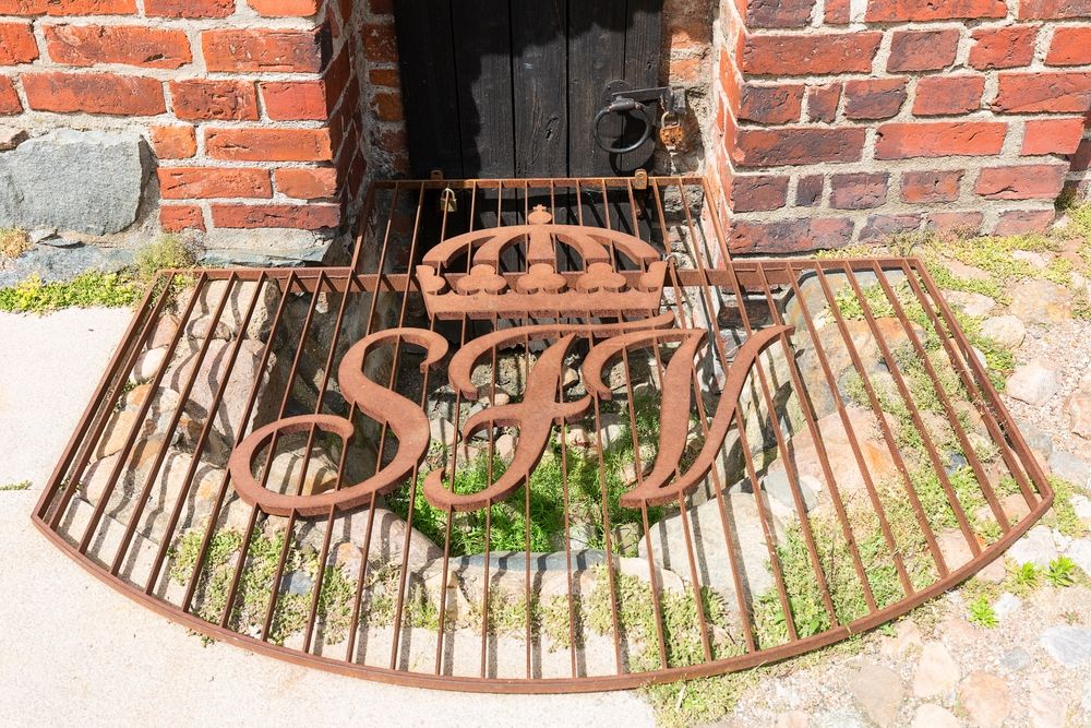 Metal decorative initials at Malmo Castle