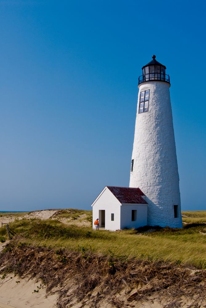 A person going inside Coskata-Coatue Wildlife Refuge's lighthouse