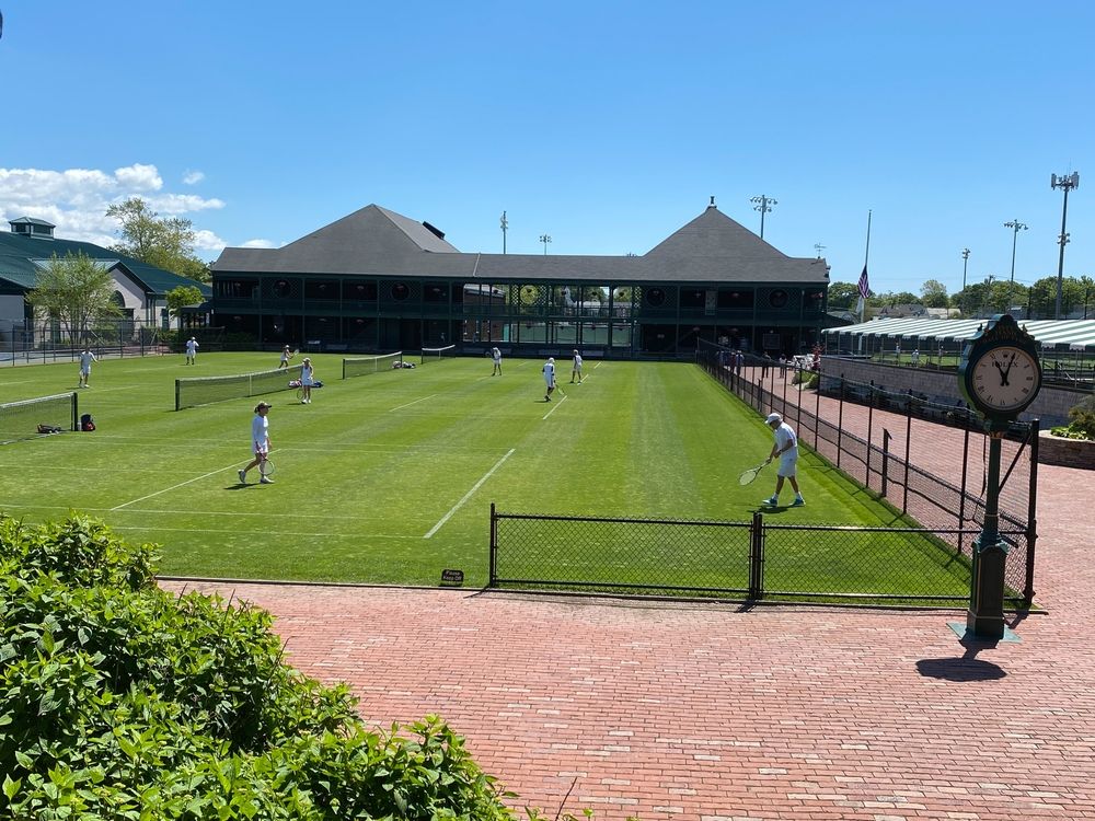People playing at the International Tennis Hall of Fame