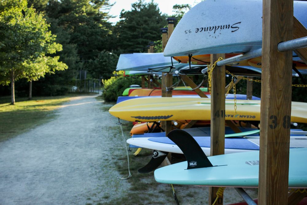 Boats stacked at Lake Massapoag