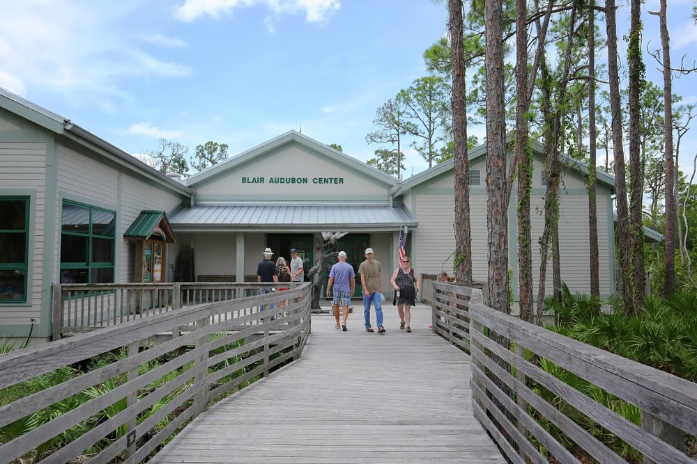People at the entrance of Audubon Corkscrew Swamp Sanctuary