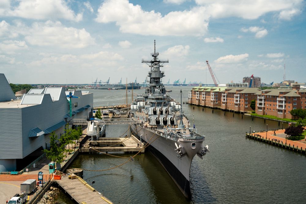 The battleship USS Wisconsin docked beside Nauticus