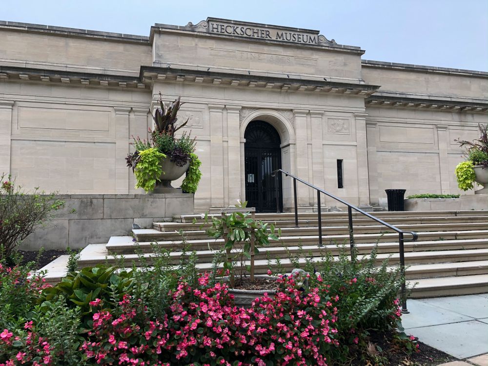Pink flowers in front of Heckscher Museum of Art
