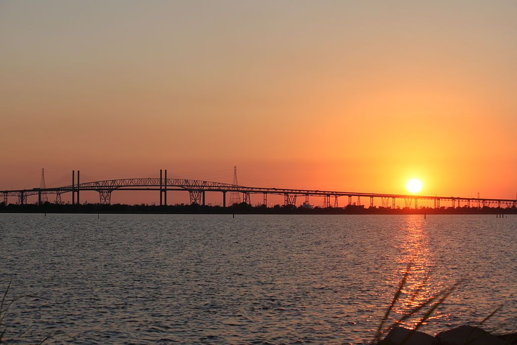 Silhouette of Rainbow Bridge during sunset