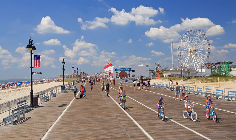 Kids riding their bike along Ocean City Boardwalk
