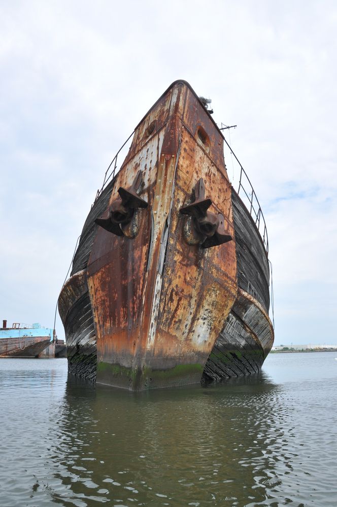 Front view of a boat at the Staten Island Boat Graveyard