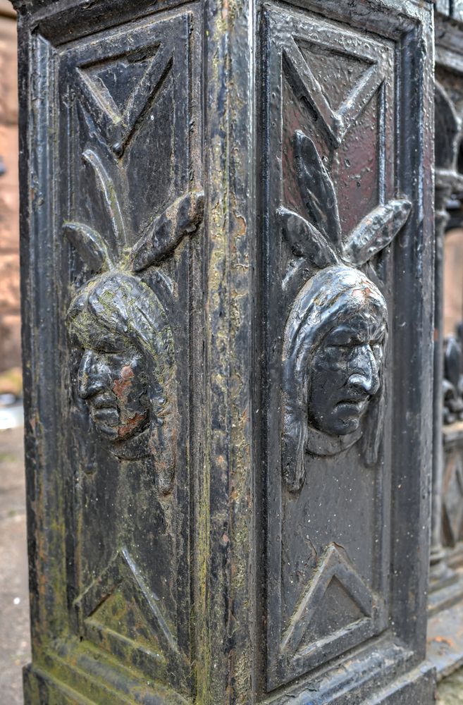 Face shapes on a pole of montauk club.