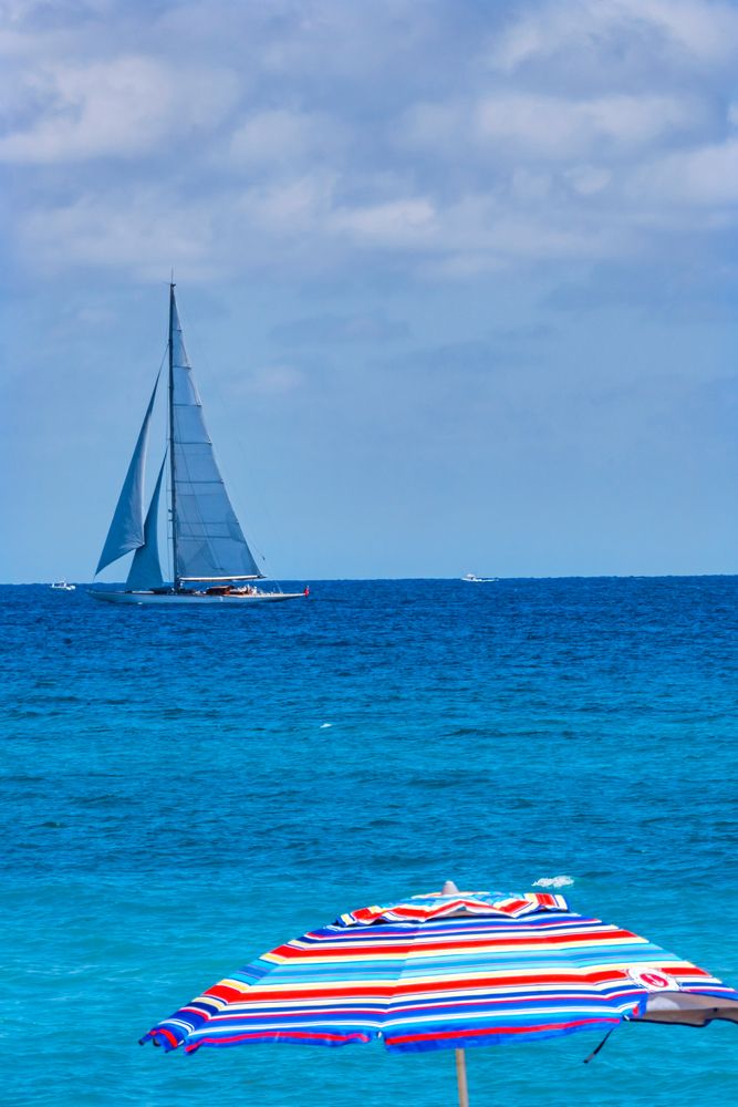 A sailboat on Municipal Beach waters