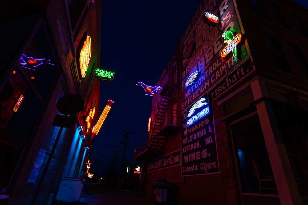A collection of signs at Neon Alley