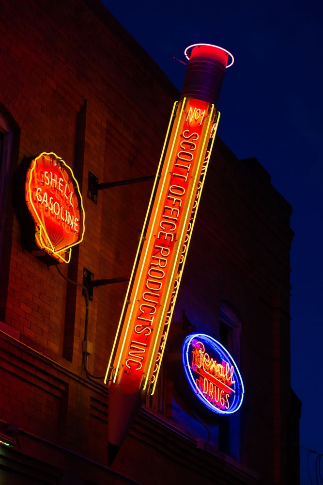Pencil-shaped sign at Neon Alley
