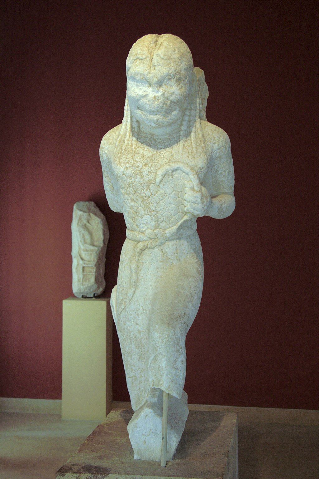 Gorgon statue in Archaeological Museum of Paros