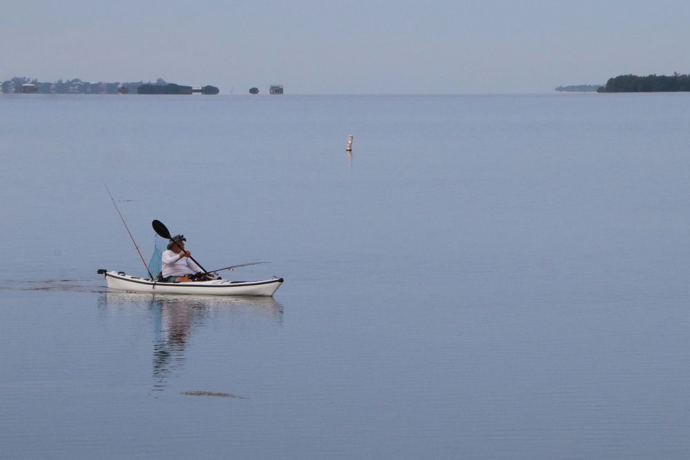 A person kayaking in Pine Island