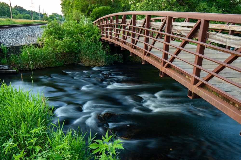 Bridge over the waters of Portage Creek Bicentennial Park