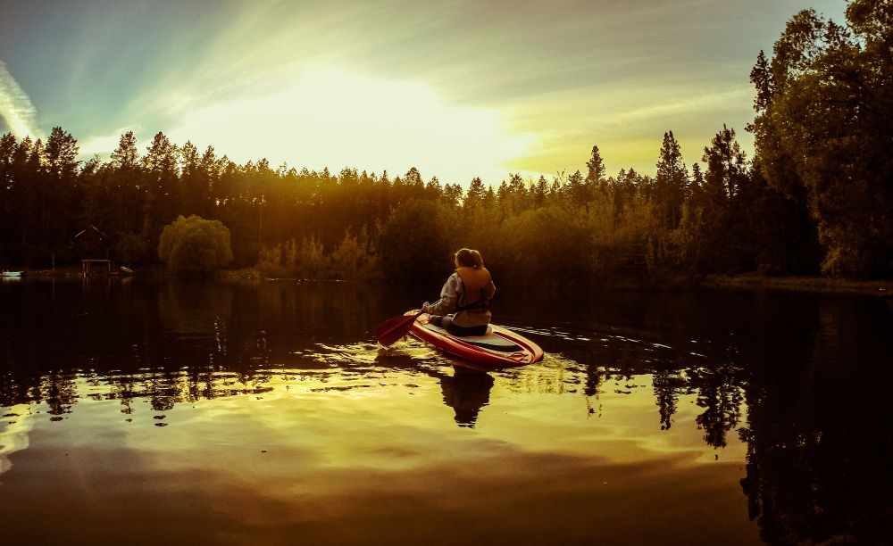 A person kayaking on Flathead Lake