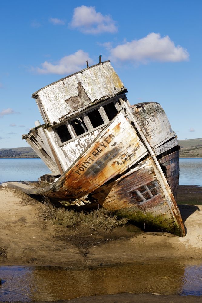 Old and falling apart SS Point Reyes Shipwreck at the shore.