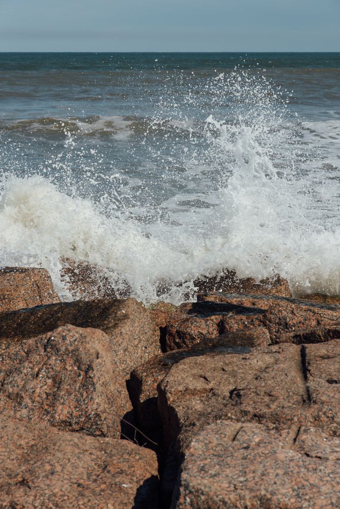 Waves crashing on Mustang Island State Park's rocky shore