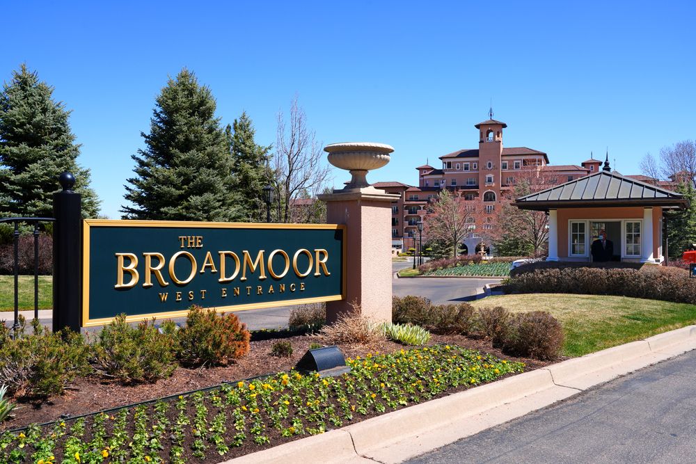 Welcome sign and exterior of Broadmoor Hotel