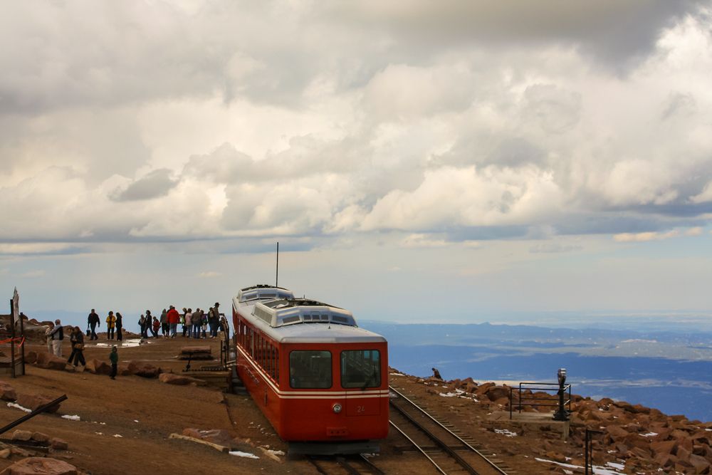 People waiting in line to ride the train of Pikes Peak Cog Railway