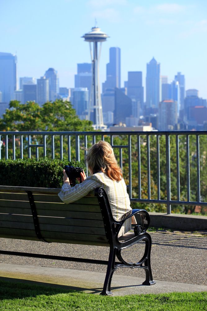 A person on Kerry Park's bench