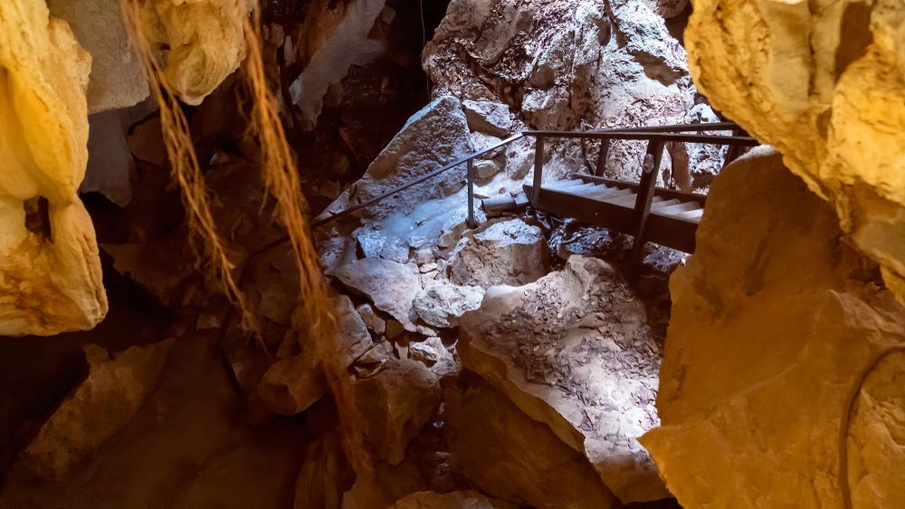 Wooden steps leading down to Capricorn Caves