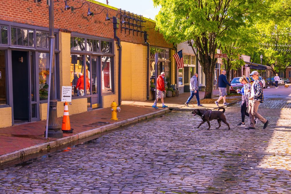 People walking along Historic City Market
