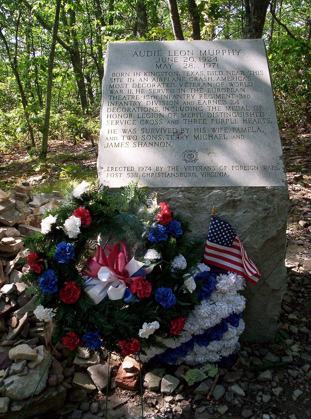 Flowers beside the Audie Murphy Monument