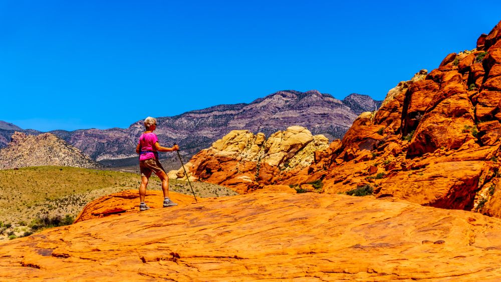 A woman hiking on Calico Hills Trail
