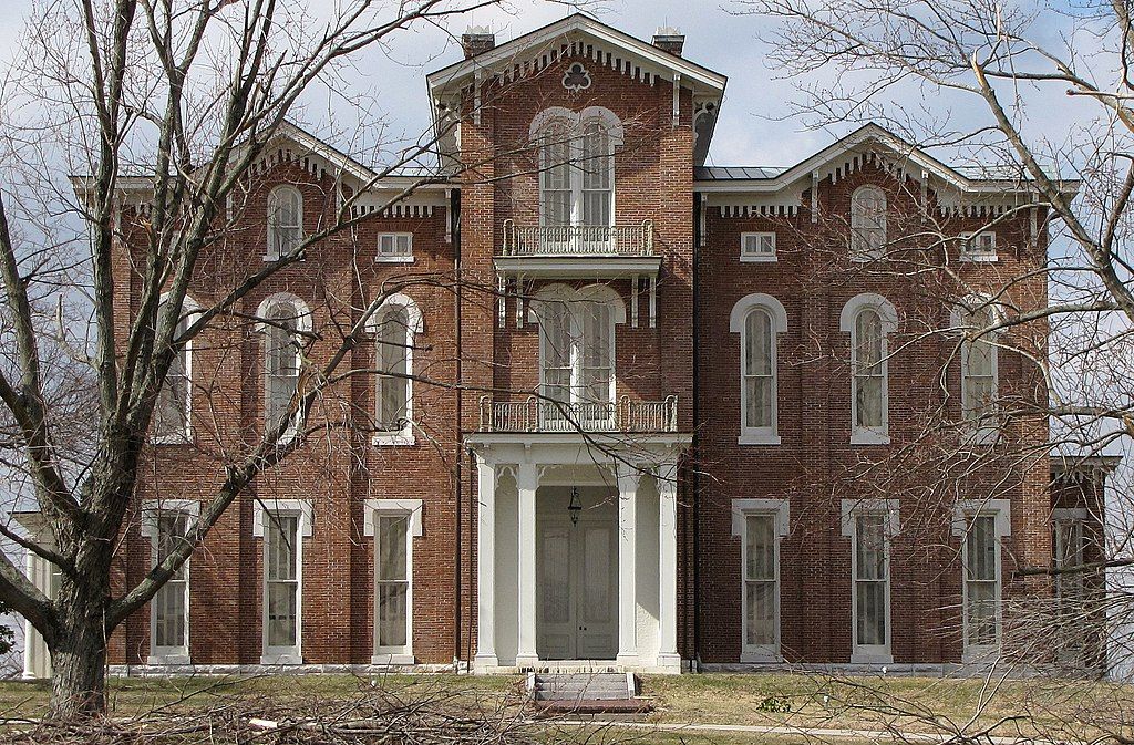 Exterior of the white hall mansion.
