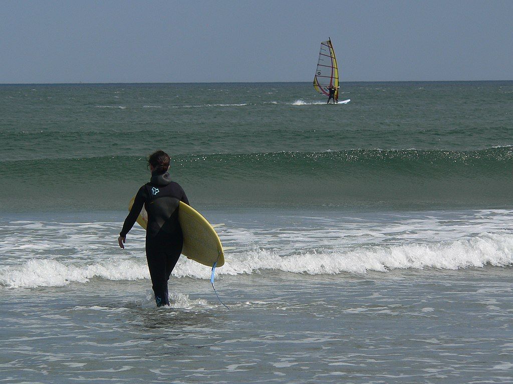 A surfer at Nahant Beach Reservation
