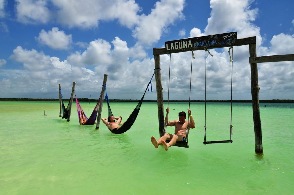 Swing sets built on Kaan Luum Lagoon's water
