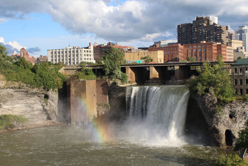 View of a waterfall from Pont de Rennes Bridge