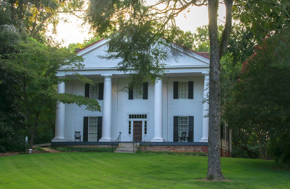 Front exterior of the white painted bulloch hall.