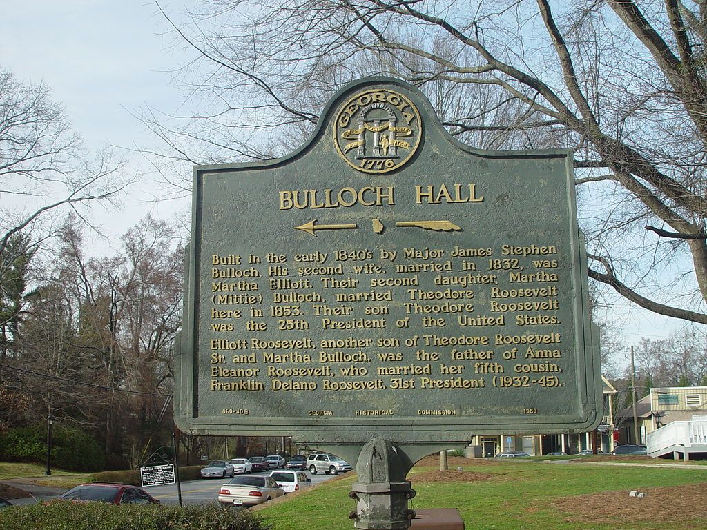 A welcoming sign post with the bulloch hall history written on it.