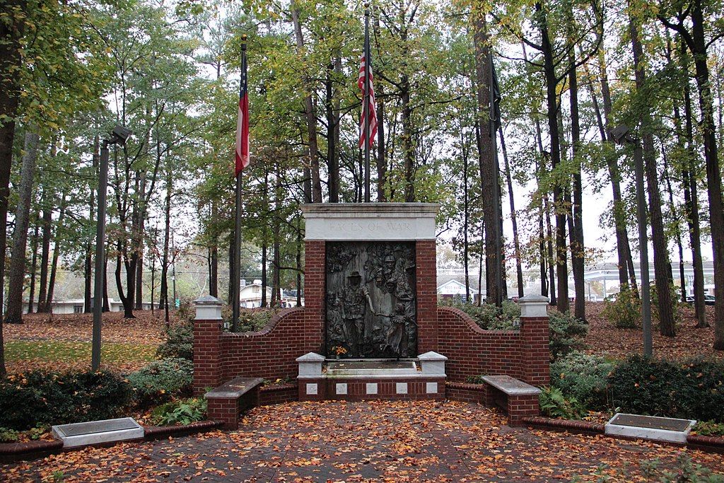Faces of war memorial featuring 50 faces from marines - on a bronze sculpture