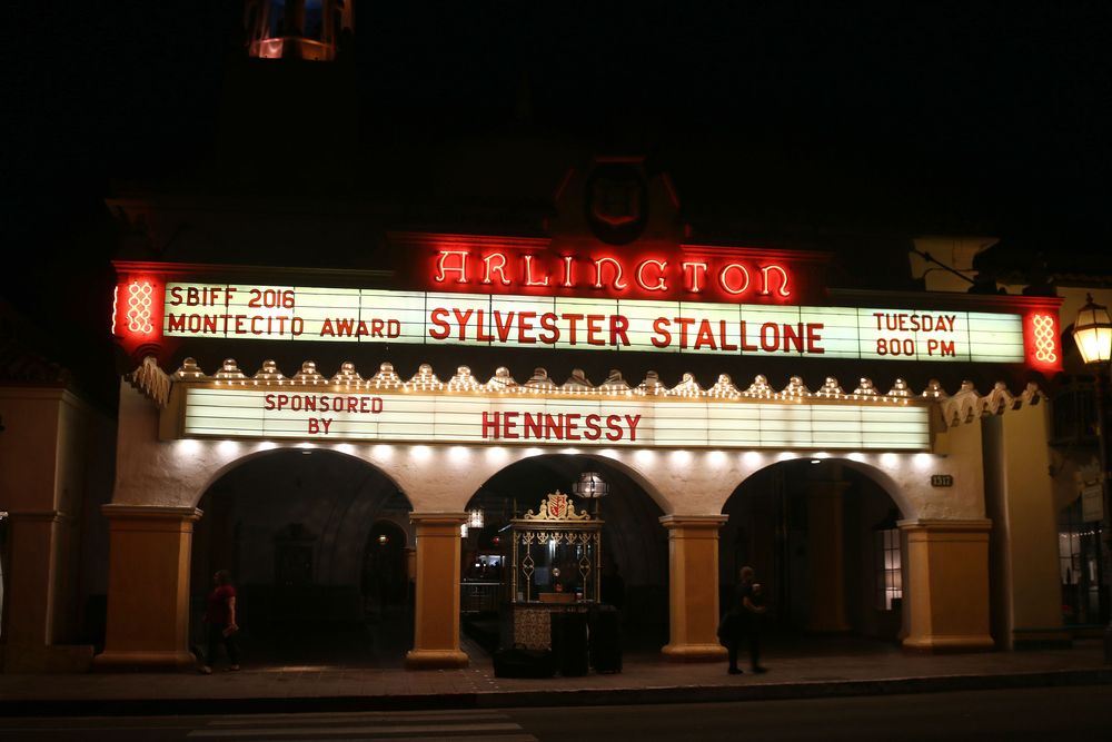 Neon lights of the Arlington Theater's marquee