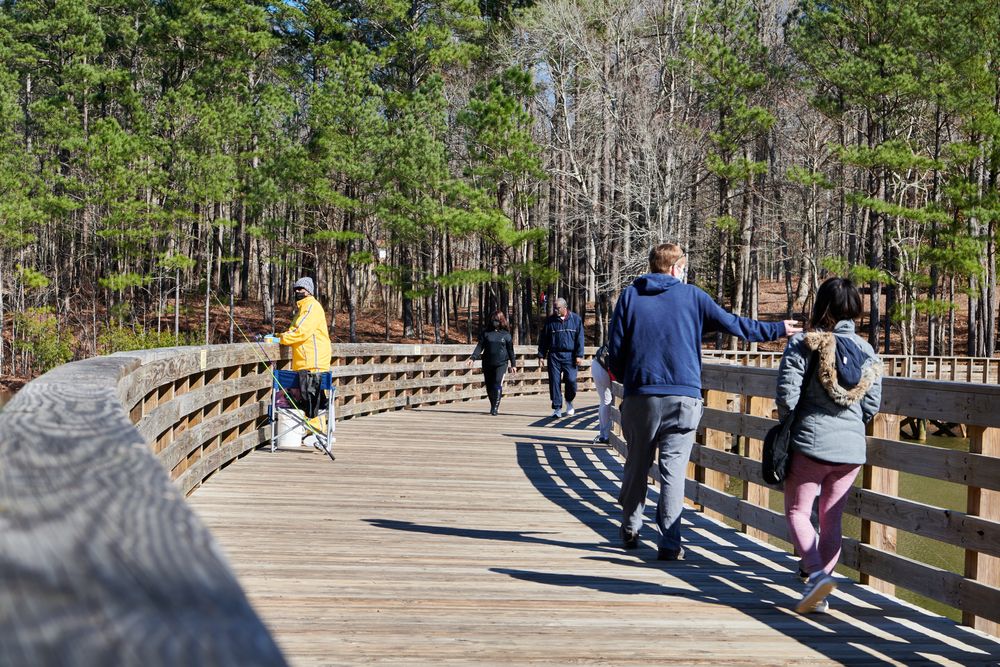 People at Clayton County International Park's boardwalk