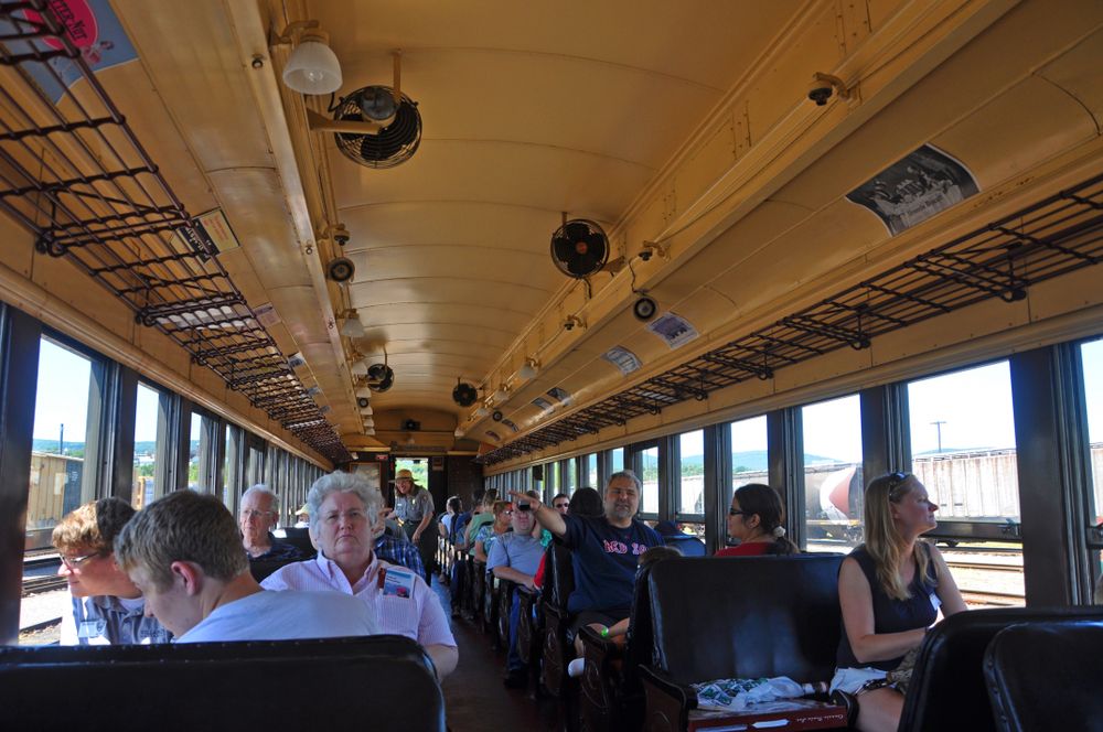 People in one of the steam trains of Steamtown National Historic Site