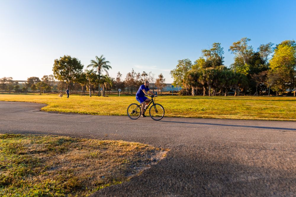 A person riding a bicycle at Markham Park