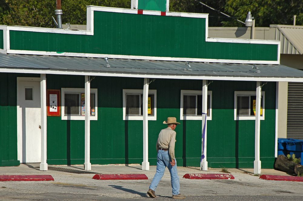 A Man Walking in the Street