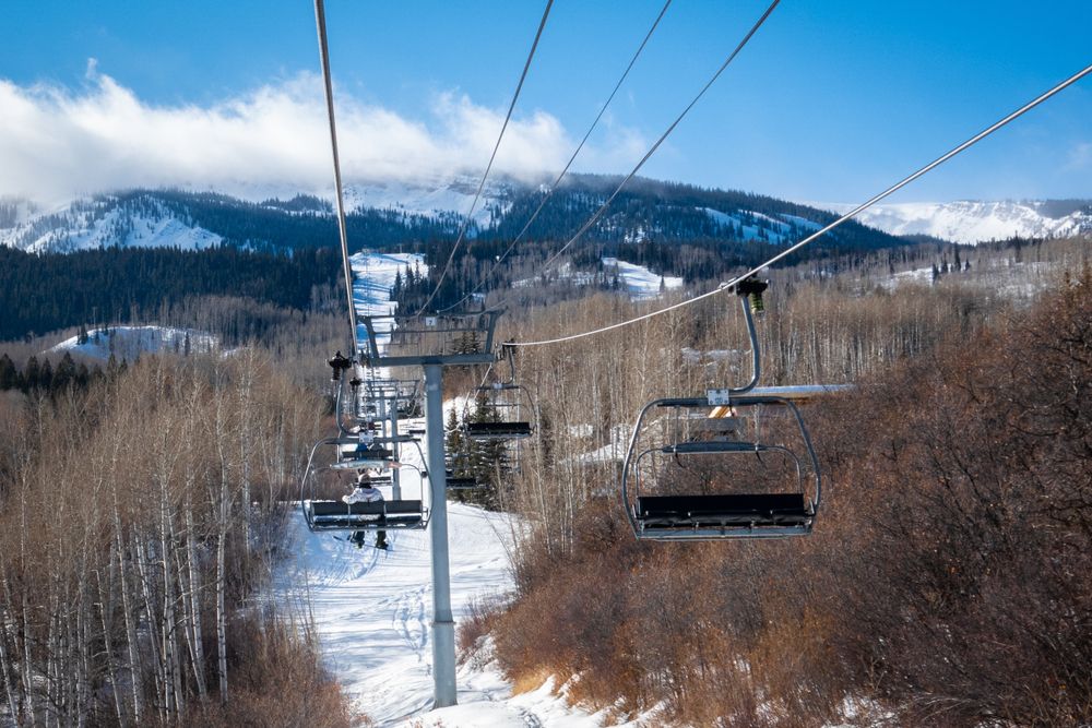 Chairlifts at the aspen snowmass ski park.