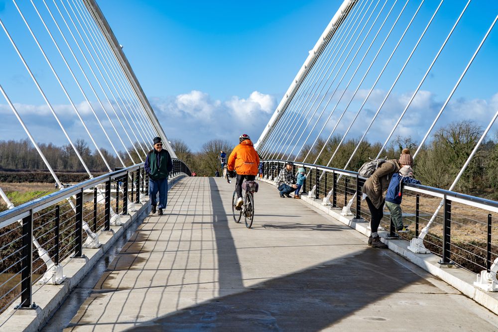 Bicycle ride along Minto-Brown Island Park's bridge