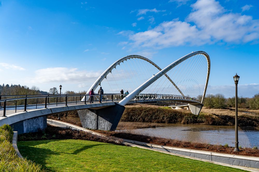People along the Peter Courtney Minto Island Bicycle and Pedestrian Bridge