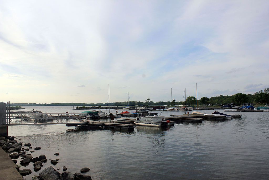 Buck creek state park marina with boats floating on the water.