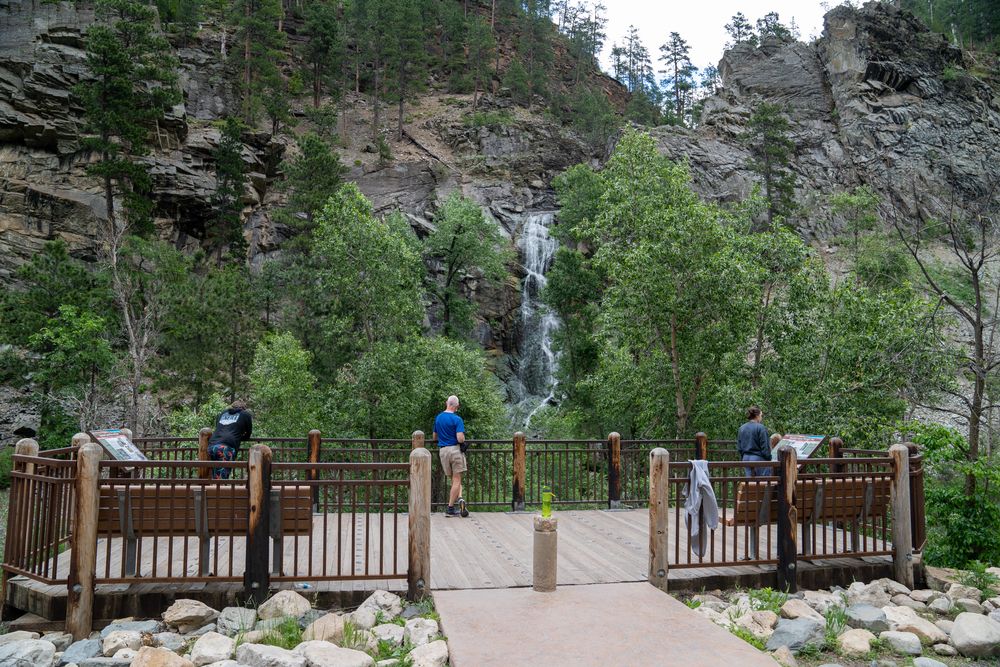 People admiring the Bridal Veil Falls