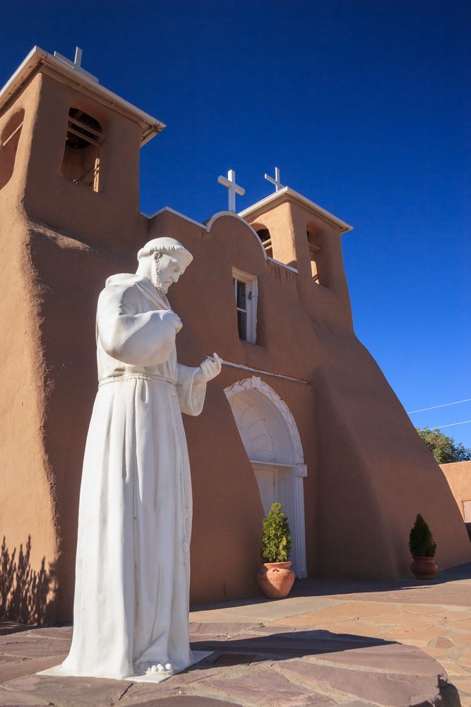 Saint francis statue in front of San Francisco de Assis Mission Church