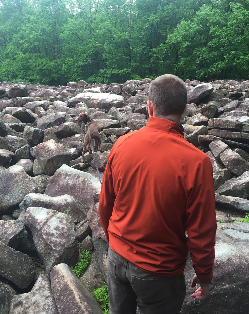 A person admiring the Ringing Rocks County Park