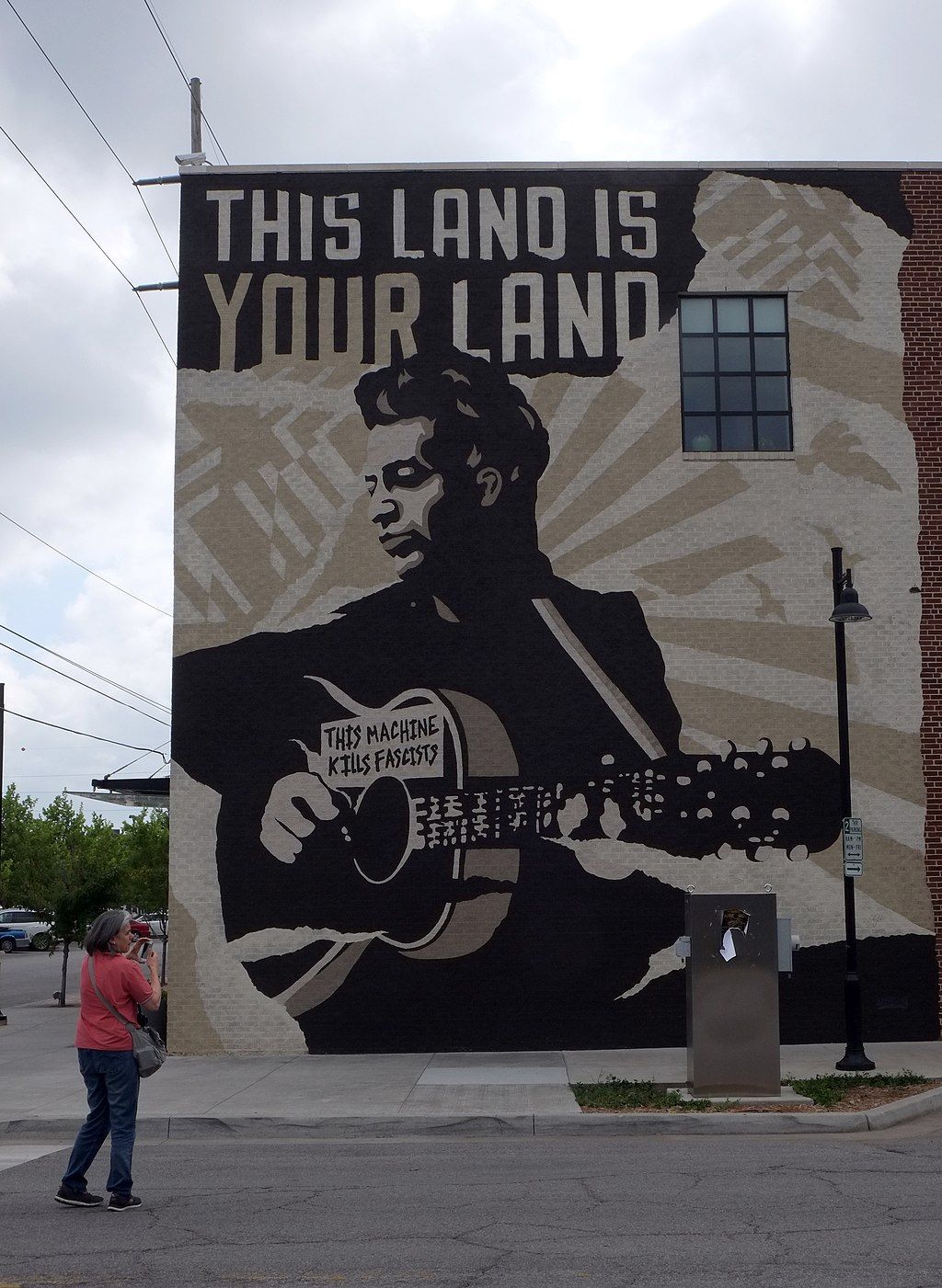 Mural on Woody Guthrie Center's facade