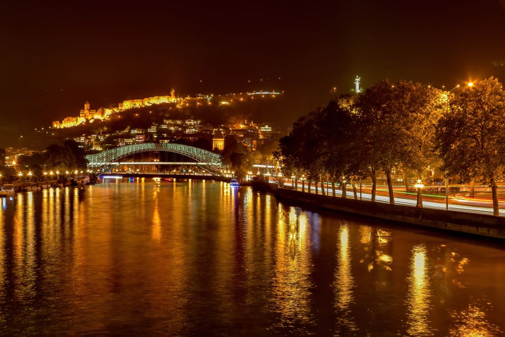 Night lights reflecting on River Kartli