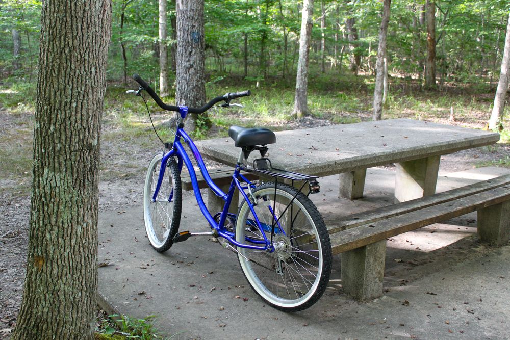 A bicycle resting against a picnic table at Tybee Island